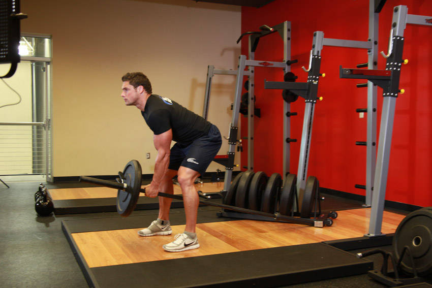 Bent Over One-Arm Long Bar Row — starting position