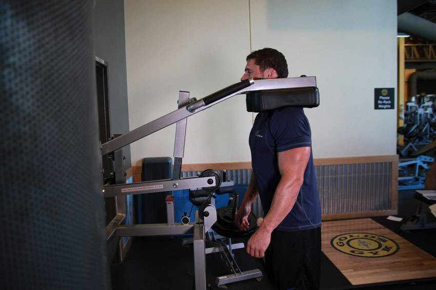 Calf-Machine Shoulder Shrug — starting position