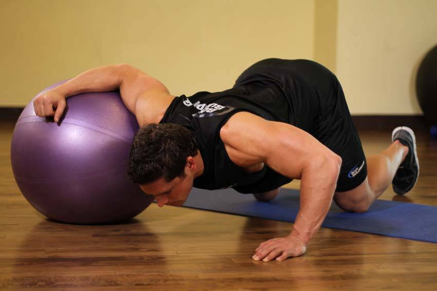 Chest Stretch on Stability Ball — starting position