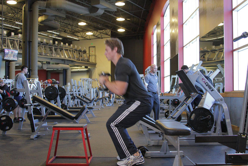 Dumbbell Seated Box Jump — end position