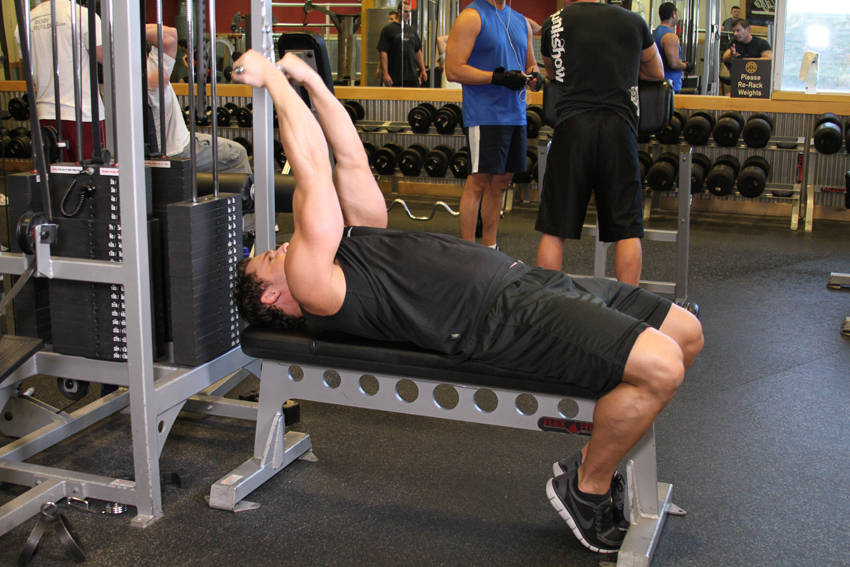 High Cable Curls — starting position