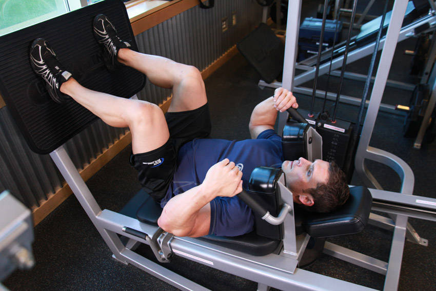 Lying Machine Squat — starting position