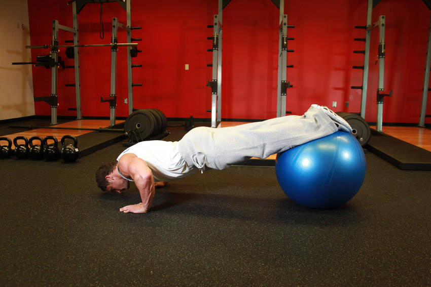 Push-Ups With Feet On An Exercise Ball — starting position